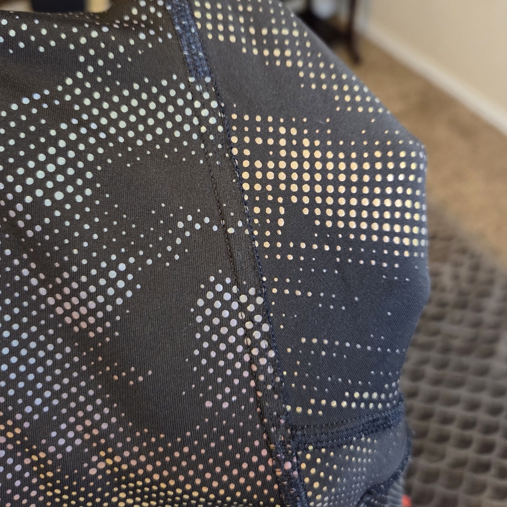 G384. Athleta Lightning Reflective 7/8 Tight in Swirl Reflective Black - Size L - Picture 9 of 12